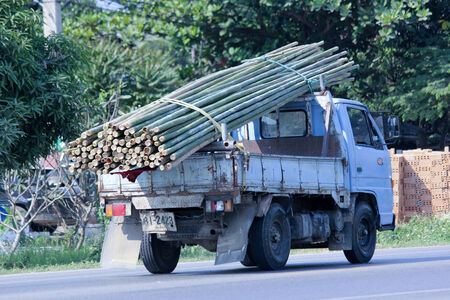CHIANGMAI, THAILAND - DECEMBER 11 2014: Private Truck for Bamboo Transportation. Photo at road no.121 about 8 km from downtown Chiangmai, thailand.のeditorial素材