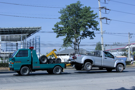 CHIANGMAI , THAILAND - DECEMBER 20 2014: SayThong Tow truck for emergency car move. Photo at road no 1001 about 8 km from downtown Chiangmai, thailand.のeditorial素材