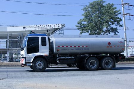 CHIANG MAI, THAILAND - DECEMBER  25 2014:  PTT Oil Truck of Sukhum Oil transport Company.  Photo at road no.1001 about 8 km from city center, thailand.のeditorial素材