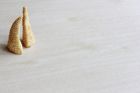 Cone of Corns Snack on Wood Background