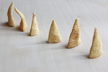 Cone of Corns Snack on Wood Background