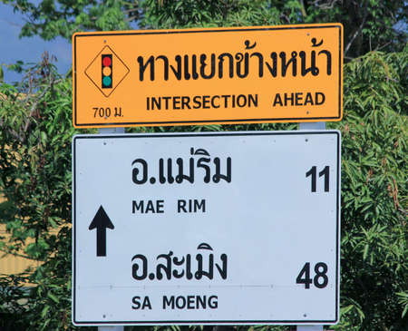 CHIANGMAI THAILAND JUNE 4 2015: Road sign at Intersection. Photo at road no.121 about 8 km from downtown Chiangmai thailand.のeditorial素材