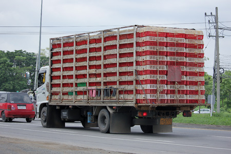 CHIANGMAI, THAILAND -AUGUST 13 2015: Truck of Songsang Company for Chicken Transport. Photo at road no 1001 about 8 km from downtown Chiangmai, thailand.のeditorial素材
