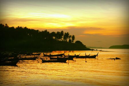Sunrise at Phuket Beach with retro effectの写真素材