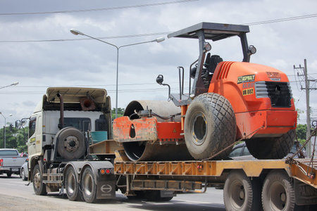 CHIANGMAI, THAILAND -SEPTEMBER  8 2015:  Trailer truck for move backhoe of PCN Asphalt Company....