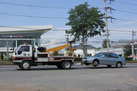 CHIANGMAI, THAILAND -NOVEMBER 19 2015:  Thai Police Tow truck for emergency car move. Photo at road no 1001 about 8 km from downtown Chiangmai, thailand.のeditorial素材