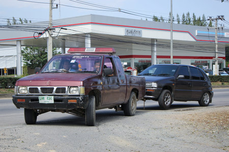 CHIANGMAI, THAILAND -NOVEMBER 19 2015:  Private Tow truck for emergency car move. Photo at road no 1001 about 8 km from downtown Chiangmai, thailand.のeditorial素材