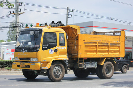 CHIANGMAI, THAILAND -MAY 27 2016: Yellow Isuzu  Dump Truck of CRC Company. Photo at road no 121 about 8 km from downtown Chiangmai, thailand.のeditorial素材