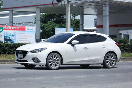 CHIANGMAI, THAILAND -AUGUST 10 2016: Private car, Mazda 3.   On road no.1001, 8 km from Chiangmai Business Area.のeditorial素材