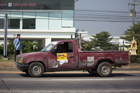 CHIANG MAI, THAILAND -FEBRUARY 20 2017:  Private Pickup car Nissan Big M. On road no.1001 8 km from Chiangmai Business Area.のeditorial素材