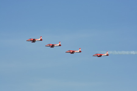 CHIANG MAI , THAILAND - DECEMBER 14 2007: HAL HJT-16 Kiran of Surya Kiran, Aerobatics demonstration team of the Indian Air Force. HJT-16 is an Indian two-seat intermediate jet trainer built by Hindustan Aeronautics Limited. Fly Over Chiangmai Sky.のeditorial素材