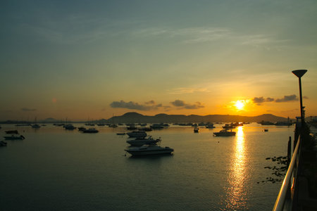 PHUKET, THAILAND -MARCH 18 2009: Sunrise at Chalong port, Main port for travel ship to krabi and phi phi island, Phuket, Thailand.のeditorial素材
