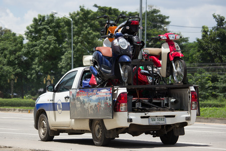 CHIANG MAI, THAILAND - AUGUST 22  2017: Honda Scooter Scoopy i Motorcycle on Pick up Truck. For Road show of Noyom Phanich Company. Photo On road no.1001.のeditorial素材