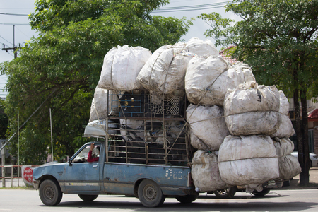 CHIANG MAI, THAILAND -SEPTEMBER 28 2017:  Over Load  Private Isuzu KB Old Pickup car. Photo at road no 121 about 8 km from downtown Chiangmai thailand.のeditorial素材