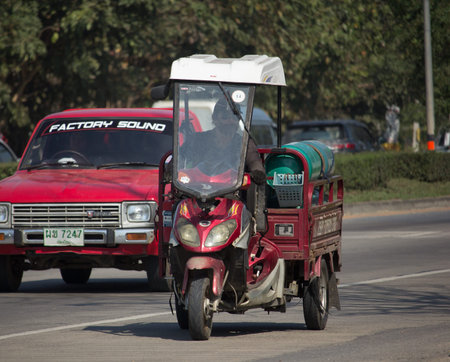 CHIANG MAI, THAILAND -JANUARY 9 2018: Private Motorcycle for delivery gas lpg to home. Photo at road...