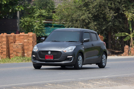CHIANG MAI, THAILAND - APRIL 3 2018: Private Eco city Car New Suzuki Swift. Photo at road no.121...