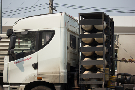 CHIANG MAI, THAILAND -MARCH 6 2018:  CAMC and CNG Tank of  Trailer Truck  of Nakhonsawan Tung Prasert company. On road no.1001.のeditorial素材