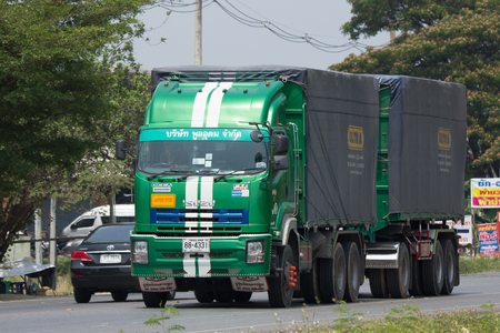 CHIANG MAI, THAILAND - APRIL  5 2018:  Poon Udom Transport Company Cargo truck. Photo at road no.1001 about 8 km from downtown Chiangmai, thailand.のeditorial素材