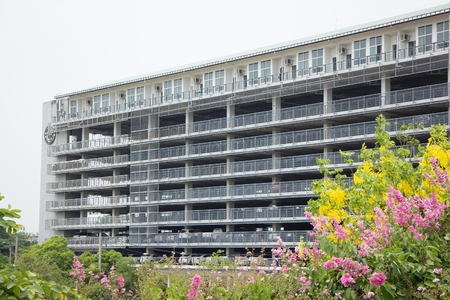 CHIANG MAI, THAILAND - APRIL 28 2018: Parking Building of Suandok Park. For Sick people. Photo at Maharaj Nakorn Chiang Mai Hospital.のeditorial素材