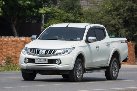 CHIANG MAI, THAILAND - APRIL 20 2018:  Private car, Mitsubishi Triton Pickup Truck. On road no.1001, 8 km from Chiangmai Business Area.のeditorial素材