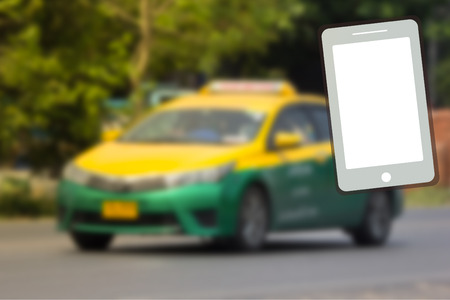 Smart phone and Blur of Taxi Car Transport ideaの写真素材
