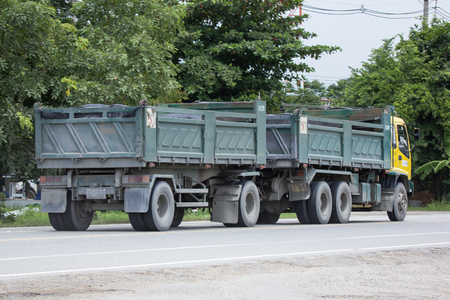 Chiangmai, Thailand - July  13 2018: Isuzu Trailer dump truck of D stone company.  On road no.1001, 8 km from Chiangmai city.のeditorial素材
