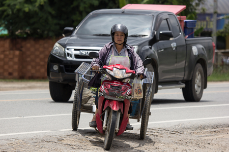 Chiangmai, Thailand - July  23 2018:  Private Motorcycle, Honda Dream. Photo at road no.121 about 8 km from downtown Chiangmai, thailand.のeditorial素材