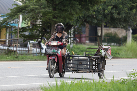 Chiangmai, Thailand - July  23 2018:  Private Motorcycle, Honda Dream. Photo at road no.121 about 8 km from downtown Chiangmai, thailand.のeditorial素材