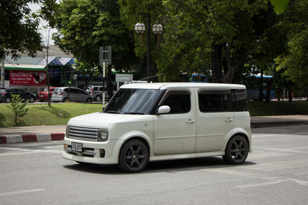 Chiangmai, Thailand - August  10 2018: Private Nissan Cube Mini van. Photo on road in chiangmai...