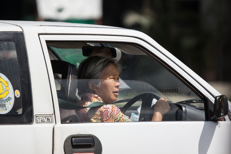 Chiangmai, Thailand - August  7 2018: Private Small city car, Daihatsu Mira. Photo at road no 121 about 8 km from downtown Chiangmai, thailand.のeditorial素材
