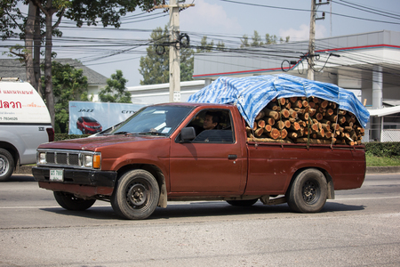 Chiangmai, Thailand - October 8 2018: Private Pickup car, Nissan Big M. On road no.1001, 8 km from Chiangmai Business Area.のeditorial素材