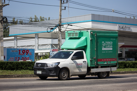 Chiangmai, Thailand - November 8 2018: Pickup Truck and Container For Tesco lotus Delivery Service. New service with shop online. Photo at road no 1001 about 8 km from downtown Chiangmai, thailand.のeditorial素材