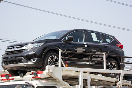 Chiangmai, Thailand - November 23 2018: ANI Logistics Group carrier trailer Truck for Honda car.   On road no.1001, 8 km from Chiangmai city.のeditorial素材