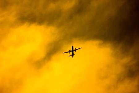 Aircraft Passenger take off  shot at sunset time backgroundの写真素材