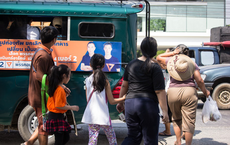 Chiangmai, Thailand - March 8 2019: Passenger of Green Pickup truck taxi Chiangmai,  Pickup truck.  On road no.1001, 8 km from Chiangmai Business Area.のeditorial素材