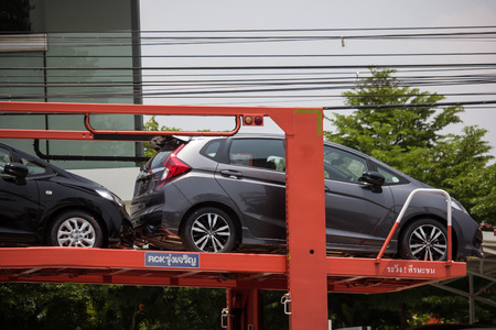 Chiangmai, Thailand - May 21 2019:  Auto Transport carrier trailer Truck for Honda car.   On road no.1001, 8 km from Chiangmai city.のeditorial素材