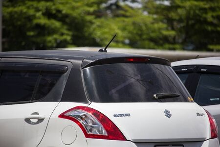 Chiangmai, Thailand - June 4 2019: Private Eco city Car Suzuki Swift. Photo at road no.121 about 8 km from downtown Chiangmai, thailand.のeditorial素材