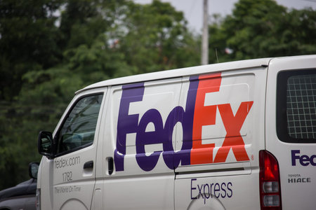 Chiangmai, Thailand - June 25 2019:  Fedex logistic van.   On road no.1001, 8 km from Chiangmai...