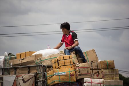 Chiangmai, Thailand - July 11 2019: Toyota DynaTruck of Saha Thip Thong Transport company. On road no.1001, 8 km from Chiangmai city.のeditorial素材