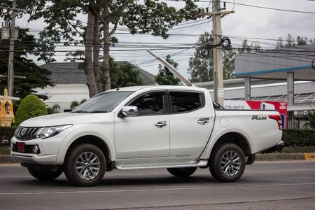Chiangmai, Thailand - July 11 2019: Private car, Mitsubishi Triton Pickup Truck. On road no.1001, 8 km from Chiangmai Business Area.のeditorial素材