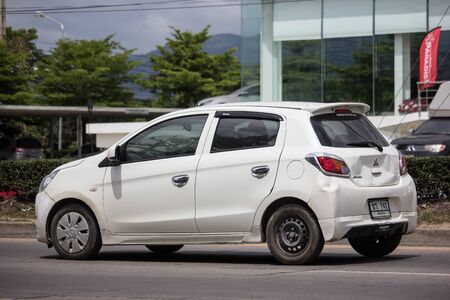 Chiangmai, Thailand - July 11 2019: Private Eco car Mitsubishi Mirage. On road no.1001 8 km from Chiangmai Business Area.のeditorial素材