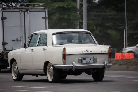 Chiangmai, Thailand - July 15 2019:  Private old  car, Peugeot 404. Photo at road no.121 about 8 km from downtown Chiangmai, thailand.のeditorial素材