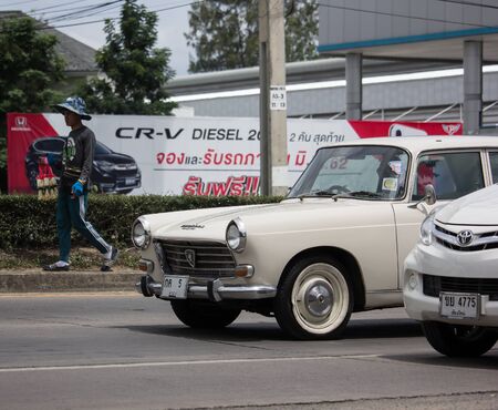 Chiangmai, Thailand - July 15 2019:  Private old  car, Peugeot 404. Photo at road no.121 about 8 km from downtown Chiangmai, thailand.のeditorial素材