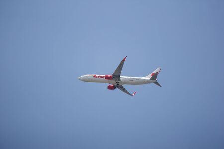 Chiangmai, Thailand - July 18 2019:  HS-LTR Boeing 737-900ER of Thai lion Air airline. Take off from Chiangmai airport to Bangkok.のeditorial素材
