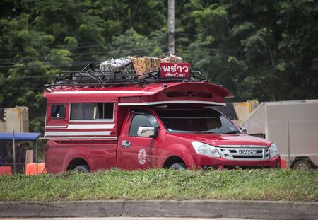 Chiangmai, Thailand - August 16 2019:  Orange mini truck taxi chiangmai, Service between city and Phrao district of Prempracha Company.のeditorial素材