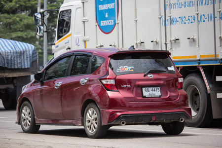 Chiangmai, Thailand - August 20 2019: Private New Eco Car Nissan Note. On road no.1001 8 km from Chiangmai city.のeditorial素材