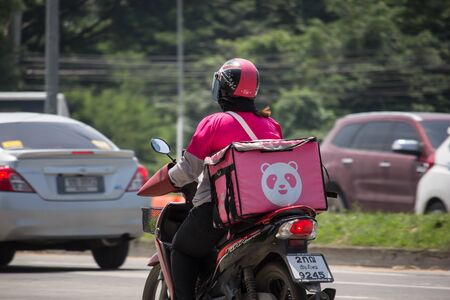Chiangmai, Thailand - September 27 2019: Delivery service man ride a Motercycle of Food Panda. On road no.1001, 8 km from Chiangmai city.のeditorial素材