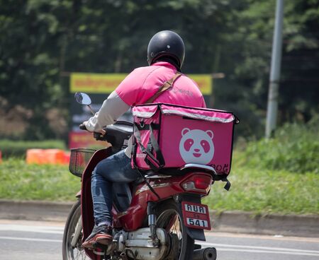 Chiangmai, Thailand - September 27 2019: Delivery service man ride a Motercycle of Food Panda. On road no.1001, 8 km from Chiangmai city.のeditorial素材