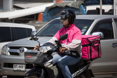 Chiangmai, Thailand -  October 1 2019: Delivery service man ride a Motercycle of Food Panda. On road no.1001, 8 km from Chiangmai city.のeditorial素材