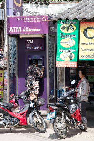 Chiangmai, Thailand -  October 5 2019: ATM Machine in  Phudoi Market. Local Market in Urban fringe of chiangmai city.のeditorial素材